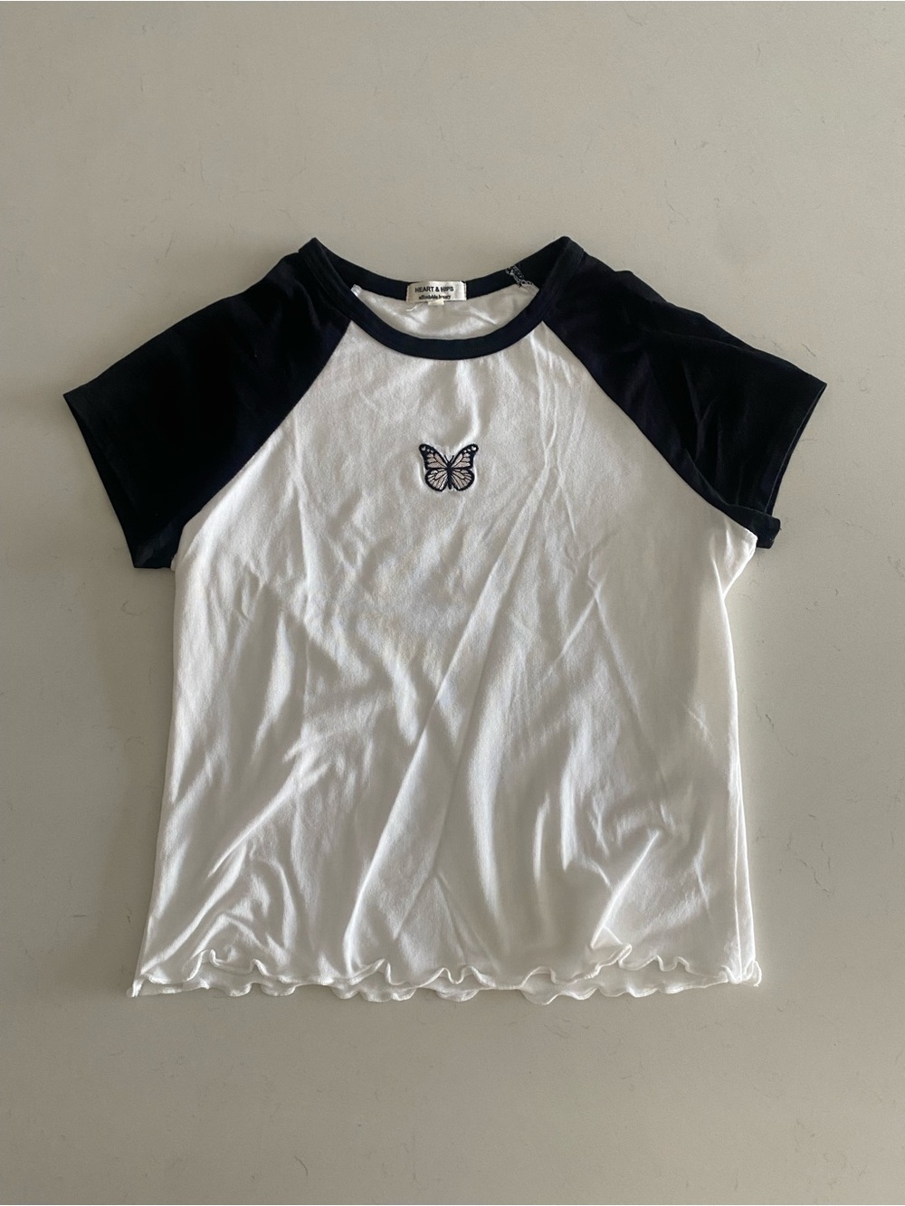 Heart Hips White Tee with Black Raglan Sleeves & Butterfly Patch